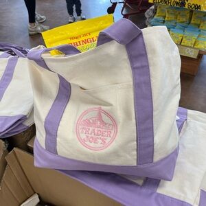 Viral NWT TRADER JOE’s Ivory Cream Canvas Tote with Lavender Accents & Pink logo